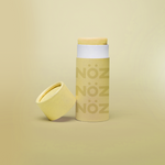 Load image into Gallery viewer, Front view of NÖZ facial sunscreen the the shade yellow.

